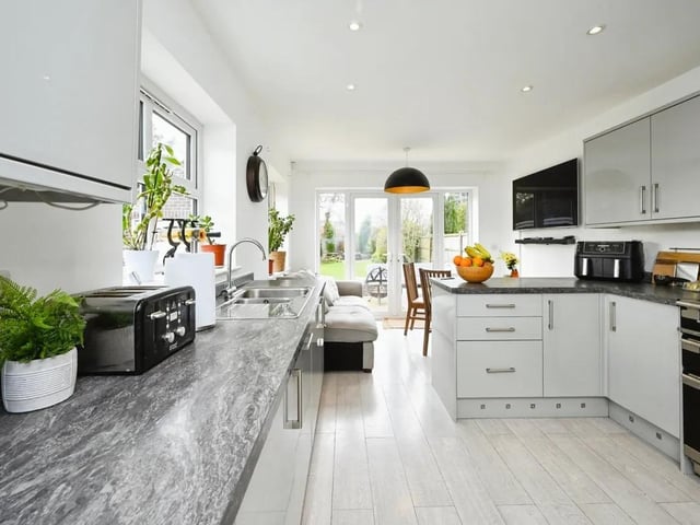 The well-appointed kitchen combines functionality and style.