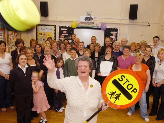 Having a lollipop lady or lollipop man was a significant part of the primary school experience. The photo shows Sylvia Caunt who served as a lollipop lady for 20 years, as featured in your Chad back in 2007. She is seen here throwing her hat away as she retires, surrounded by friends and colleagues.
