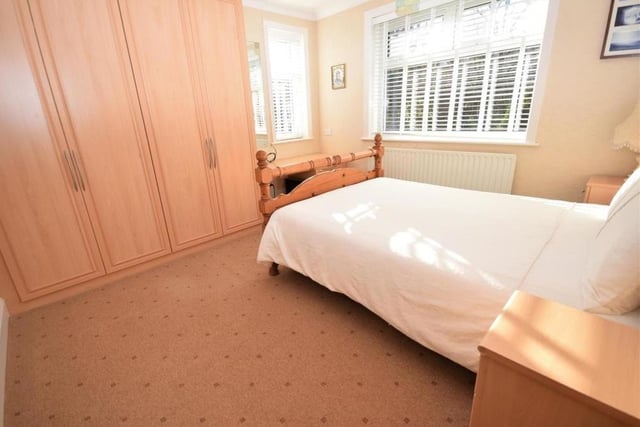 Comfort and style emanate from all the rooms in the Ravenshead house - and this bedroom, complete with its huge built-in wardrobes, is no different.