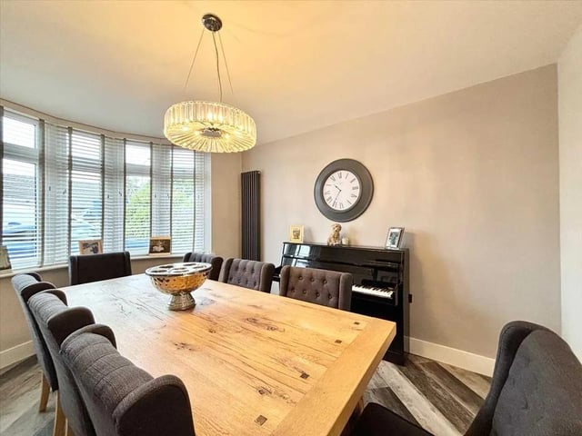 The separate dining room offers ample room for family dining or entertaining guests and offers pocket doors giving you maximum space.