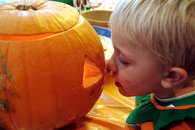 2006: this young man goes nose to nose with a pumpkin during a Hallowe’en party at Hucknall Leisure Centre.