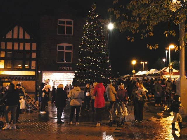 Visitors enjoying the light switch on event at Sutton 