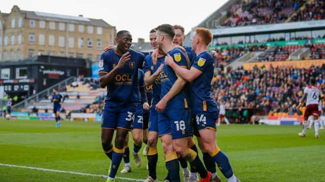 Stags celebrate Rhys Oates’s first half goal during the  win at Bradford. They now have three key games ahead which could define the season.