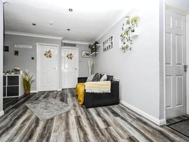 This pleasant hallway links many of the rooms in the Sutton bungalow.