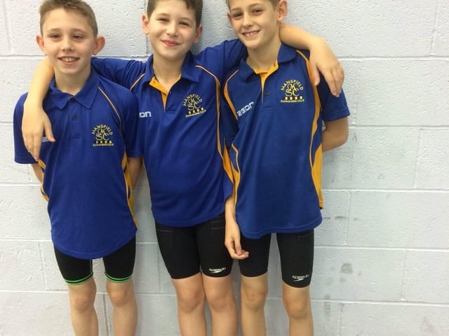 A Mansfield Swimming Club trio prepare for a training night.