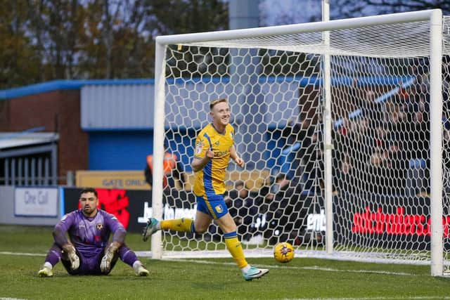 Mansfield Town forward Davis Keillor-Dunn (40) celebrates his 2nd half goal during the Sky Bet League 2 match against Newport County AFC at the One Call Stadium, 18 Nov 2023 
Picture credit  -  Chris & Jeanette Holloway / The Bigger Picture.media