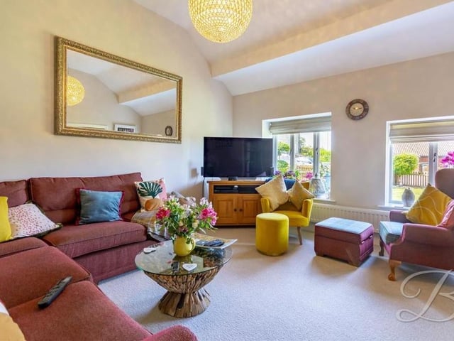 Thanks to double windows beaming in natural light, the living room is bright and cheerful. With its carpeted floor and two central-heating radiators, it is warm and homely, and a lovely room in which to relax.