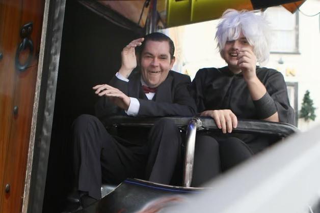 Managing to laugh it off after taking a ride on the ghost train