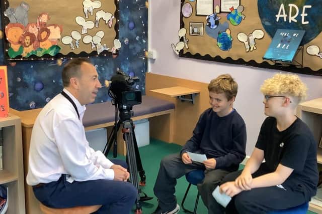 Abbey Hill's children interviewing ITV's Peter Bearne