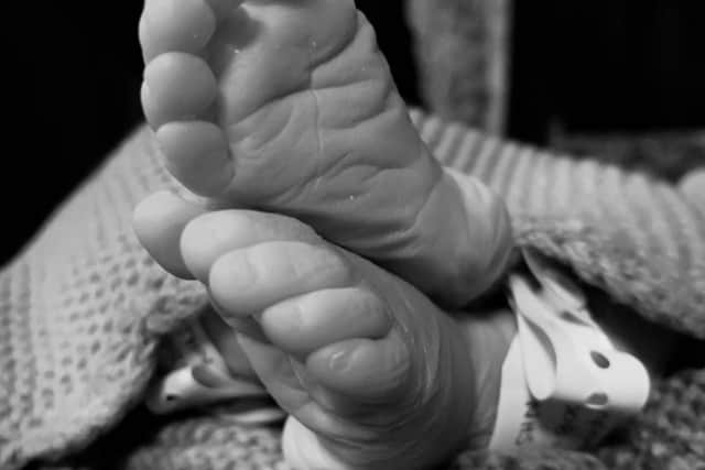 Heartbreaking:  a photograph of Albie's tiny feet.