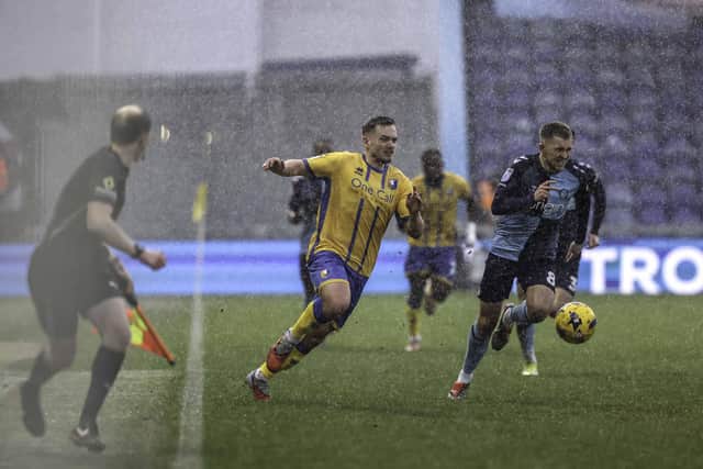 Mansfield Town winger Luke Bolton (27) in action in the rain during the Sky Bet League 1 match against Wycombe Wanderers FC at the One Call Stadium, 31 Jan 2026, Photo credit Chris & Jeanette Holloway / The Bigger Picture.media