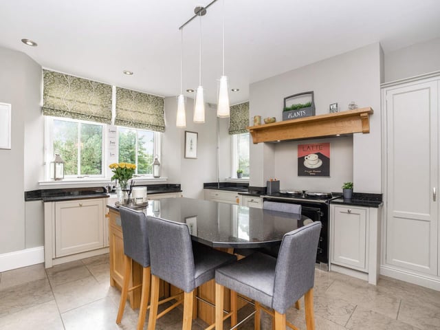 The kitchen lets in copious amounts of natural light and is finished to a high standard