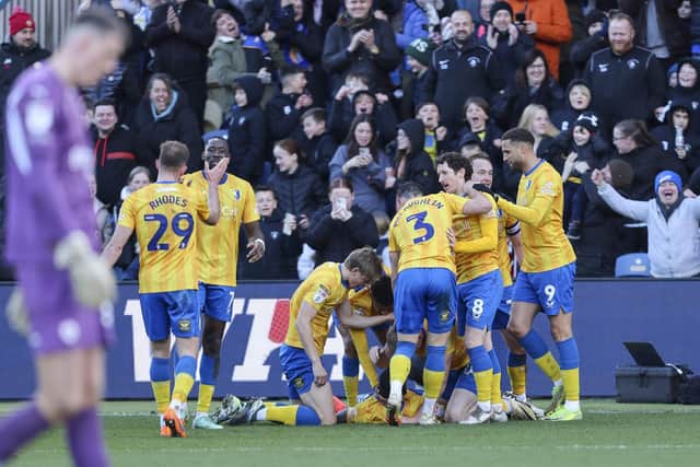 Stags celebrate late winner during the Sky Bet League One match against Barnsley FC at the One Call Stadium, 15 March 2025, Photo credit Chris & Jeanette Holloway / The Bigger Picture.media