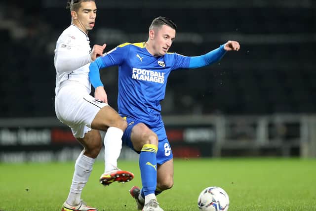 Anthony Hartigan has joined Mansfield Town after leaving AFC Wimbledon in July.