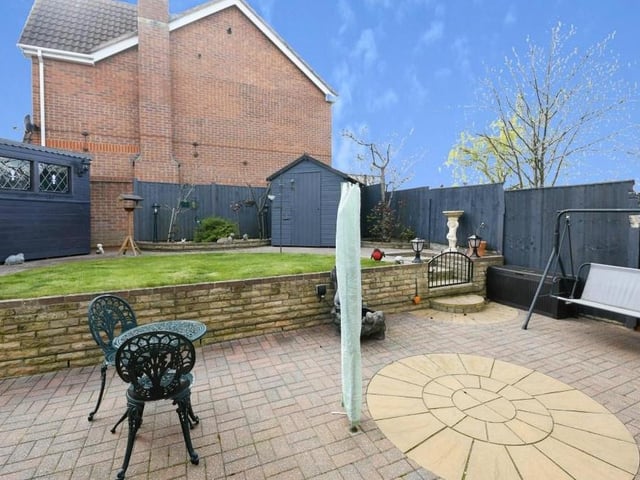 A final look at the Shearsby Drive house shows the patio area within the private, enclosed back garden. Bet you wouldn't mind spending a few summer afternoons and evenings out here.