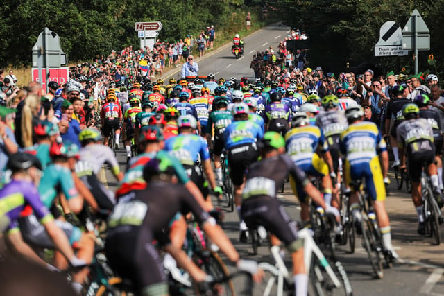 The peloton rolling out during the neutralised start in Sherwood Forest.