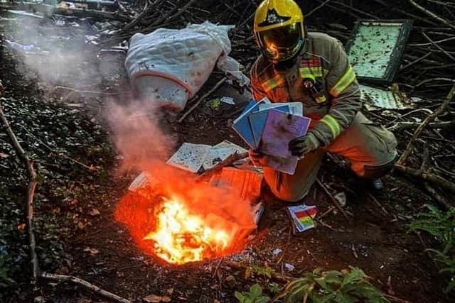Firefighters at a deliberate fire.