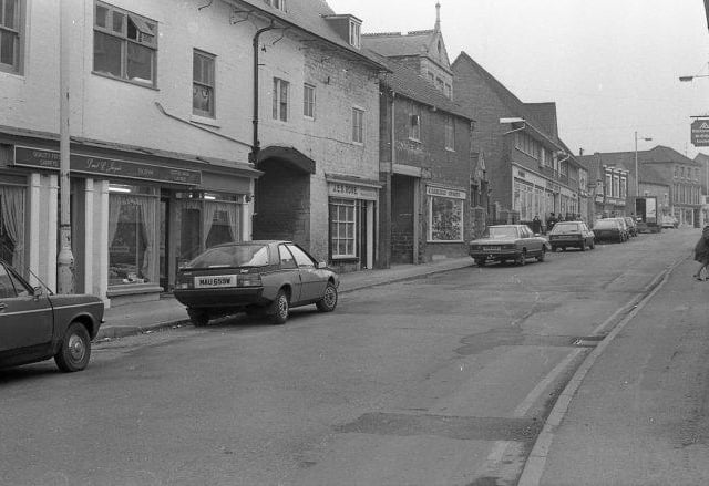 Classic cars and old shops.