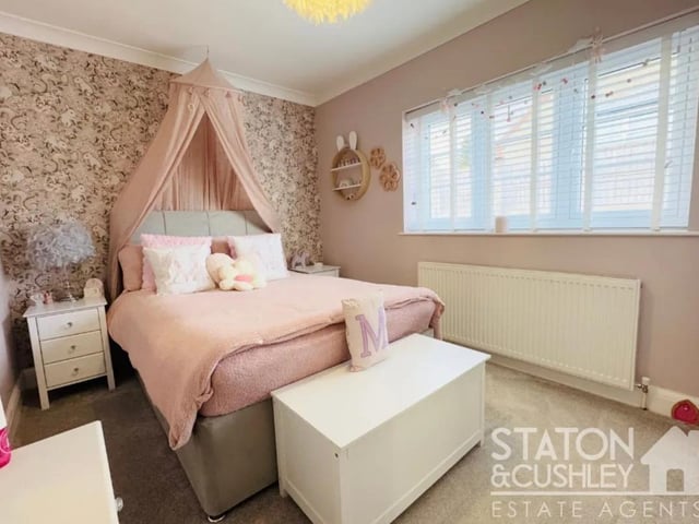 There is ample bedroom space for a growing family.