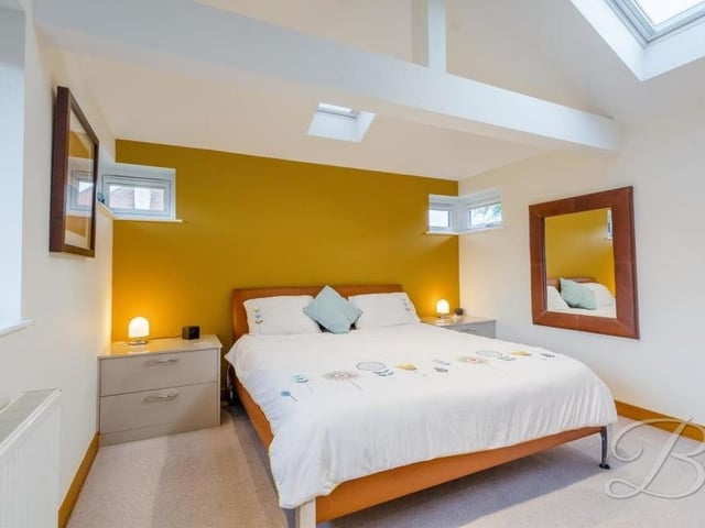 The first bedroom to check out is the master, which has the luxury of stunning fitted wardrobes and modern features, including remote-controlled Velux windows and blackout blinds. From its vaulted ceiling to its carpeted floor, it is a superb room.