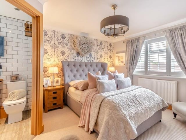 Time to go upstairs now and straight into the marvellous master bedroom, which is a good size and overlooks the front of the £465,000 house. It has access to an en suite shower room.