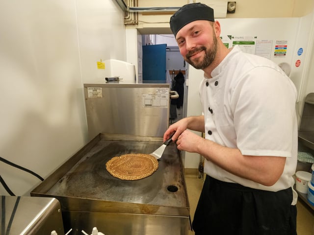 When small bubbles appear in the pancake and it his browned on the underside, flip the pancake so that it cooks evenly.