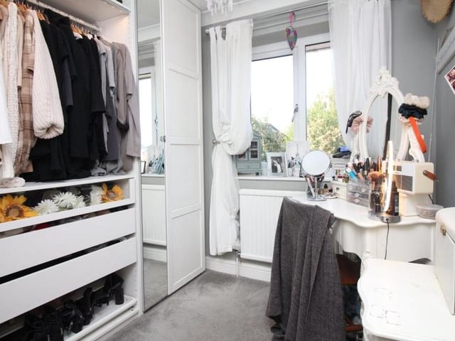 An example of a fitted wardrobe in one of the four bedrooms at the Swingate house.