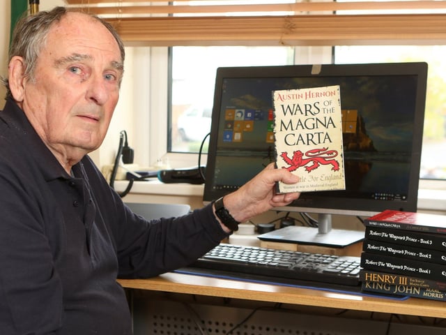 Prolific local author Austin Hernon with his latest work on Medieval England, in 2019.