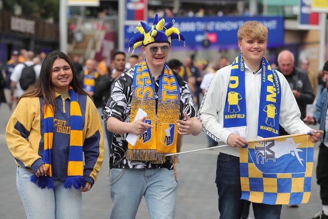 Fans bring colour to Wembley Way.