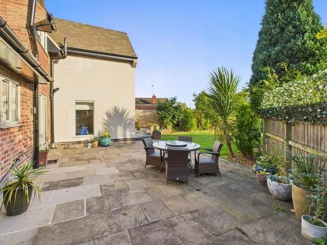 Externally, the property occupies a very generous corner plot. To the rear is a generously sized south-facing mature garden with large, paved patio area perfect for relaxing or entertaining and leads onto a well-maintained lawn bordered by mature trees and established planting.