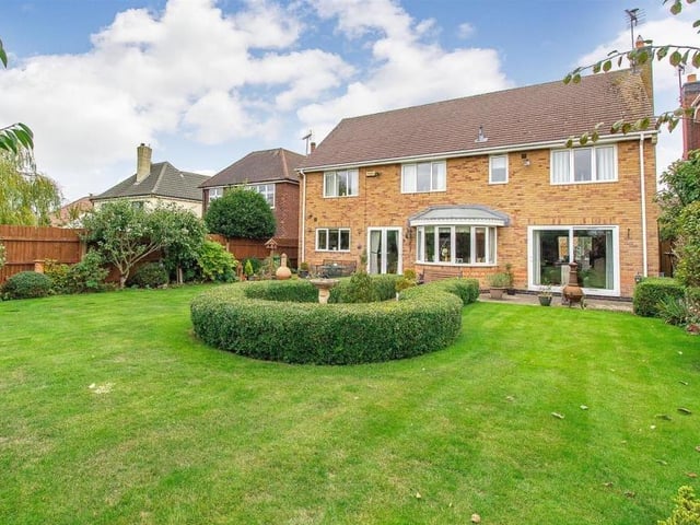 The view from the back of the £470,000 property is almost as impressive as that from the front. The garden has been beautifully maintained and boasts a paved patio that runs the full width of the house and is ideal for entertaining family and friends when the weather suits.