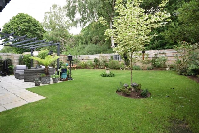The landscaped garden at the back of the £575,000-plus property is delightful. The neat lawn is dotted with planting and edged with decorative shrub borders. A secure fence complements the leafy, unspoiled and private backdrop.