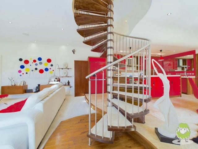 A magnificent spiral staircase in the open-plan space leads to the first floor of the unique £470,000 Mansfield property.