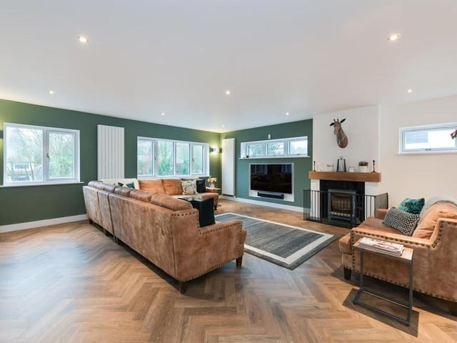 From the landing, you walk into this spacious and comfortable lounge.
