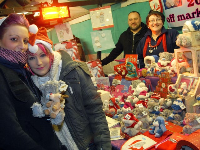 Mansfield Christmas Lights switch on Crissy Barfoot and Kim Downs visit Godfrey's stall on the Christmas Honeypot market.