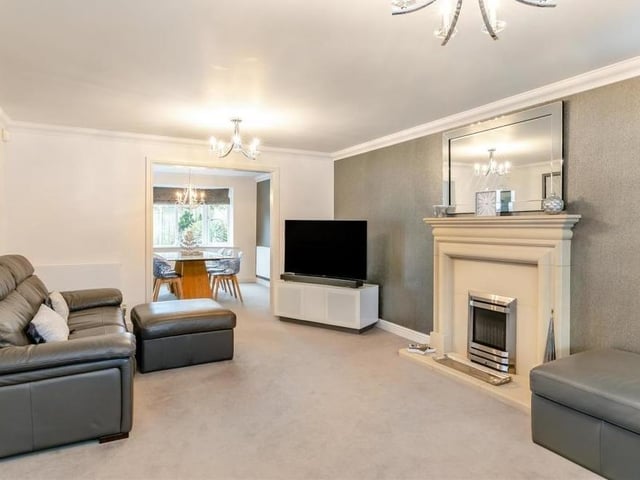 This is the lounge from a different angle. It shows how spacious the room is and how it opens through to the dining room.