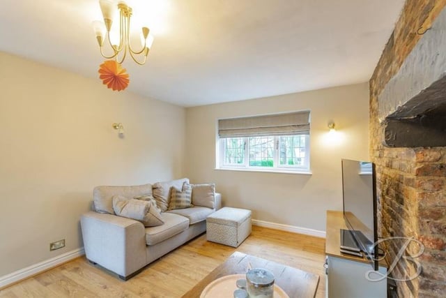 On cold winter's evenings like these, why not relax in front of the telly in the £450,000 property's warm living room?