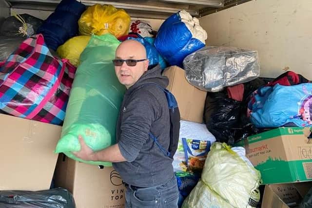 Laurentiu volunteered to help with the gathering and transportation of supplies before they were taken in convoy over the border from Romania to Ukraine.
