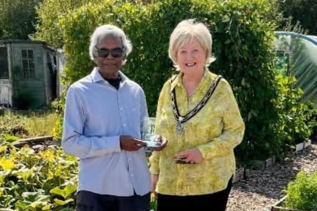 Overall winner Sam Arumugum receives his award from Mayor of Broxtowe Coun Barbara Carr. Photo: Submitted