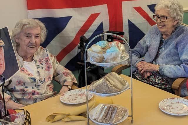 Resident Joan and Dorothy enjoying the Kings birthday celebrations