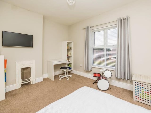 We are surely justified in banging the drum about this house! This is another view of the second bedroom.