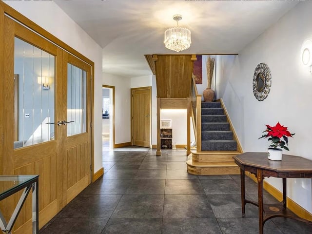 Internally, the house is both welcoming and impressive