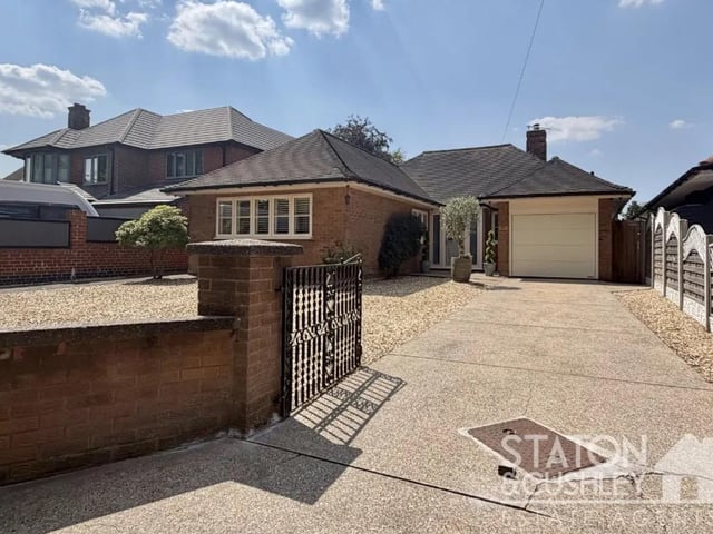 To the front of the property, a generous gated driveway provides ample off-street parking for multiple vehicles and, in turn, gives access to the garage.