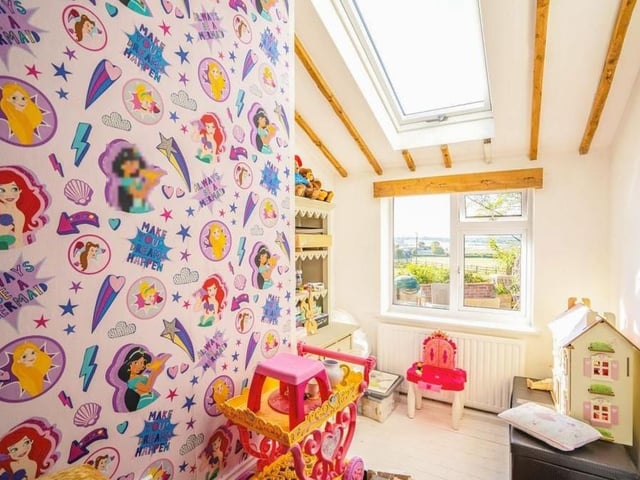 This is the lower level of the final bedroom. It is currently set up as a children's playroom, or it could be used for storage. It offers excellent views of the Selston countryside.