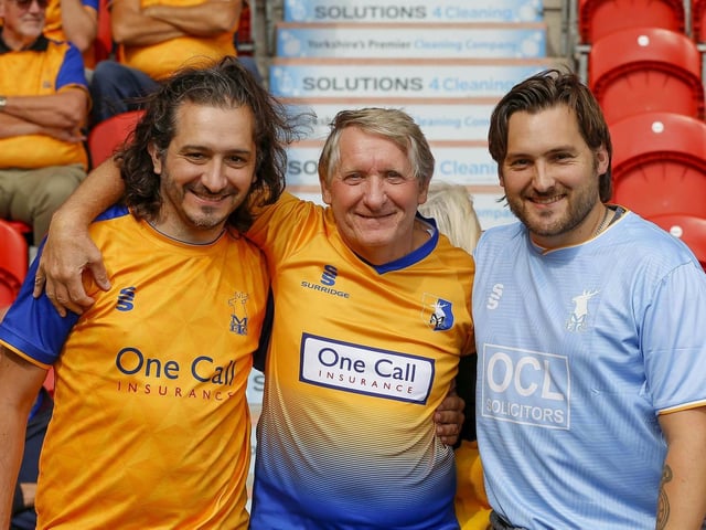 Mansfield Town fans enjoy the 3-1 win at Doncaster Rovers.