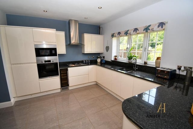 We start our tour of the Selston property on the lower floor, where the highlight is this well-appointed kitchen. Spanning the width of the property and overlooking the back garden, it is equipped with integral appliances, which include a fitted oven and microwave.