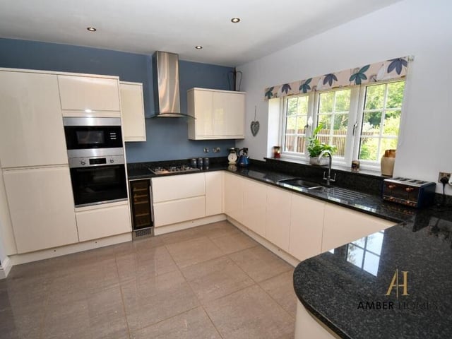 We start our tour of the Selston property on the lower floor, where the highlight is this well-appointed kitchen. Spanning the width of the property and overlooking the back garden, it is equipped with integral appliances, which include a fitted oven and microwave.