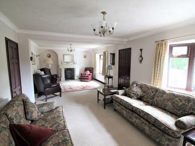 This photo demonstrates how long the lounge is. It is also bright thanks to two bay windows overlooking the front of the property.