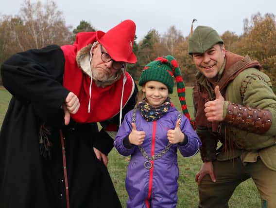The Sheriff, Robin Hood and last year’s Lord of Misrule, five-year-old Tenzin. Credit: Rob James