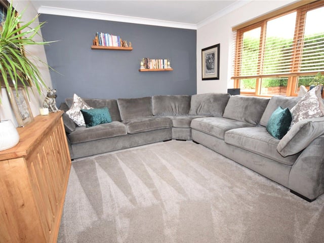 Two of the bedrooms sit on the ground floor of the £925,000 property. But this one is currently being used as a very comfortable snug, with a window facing the rear.